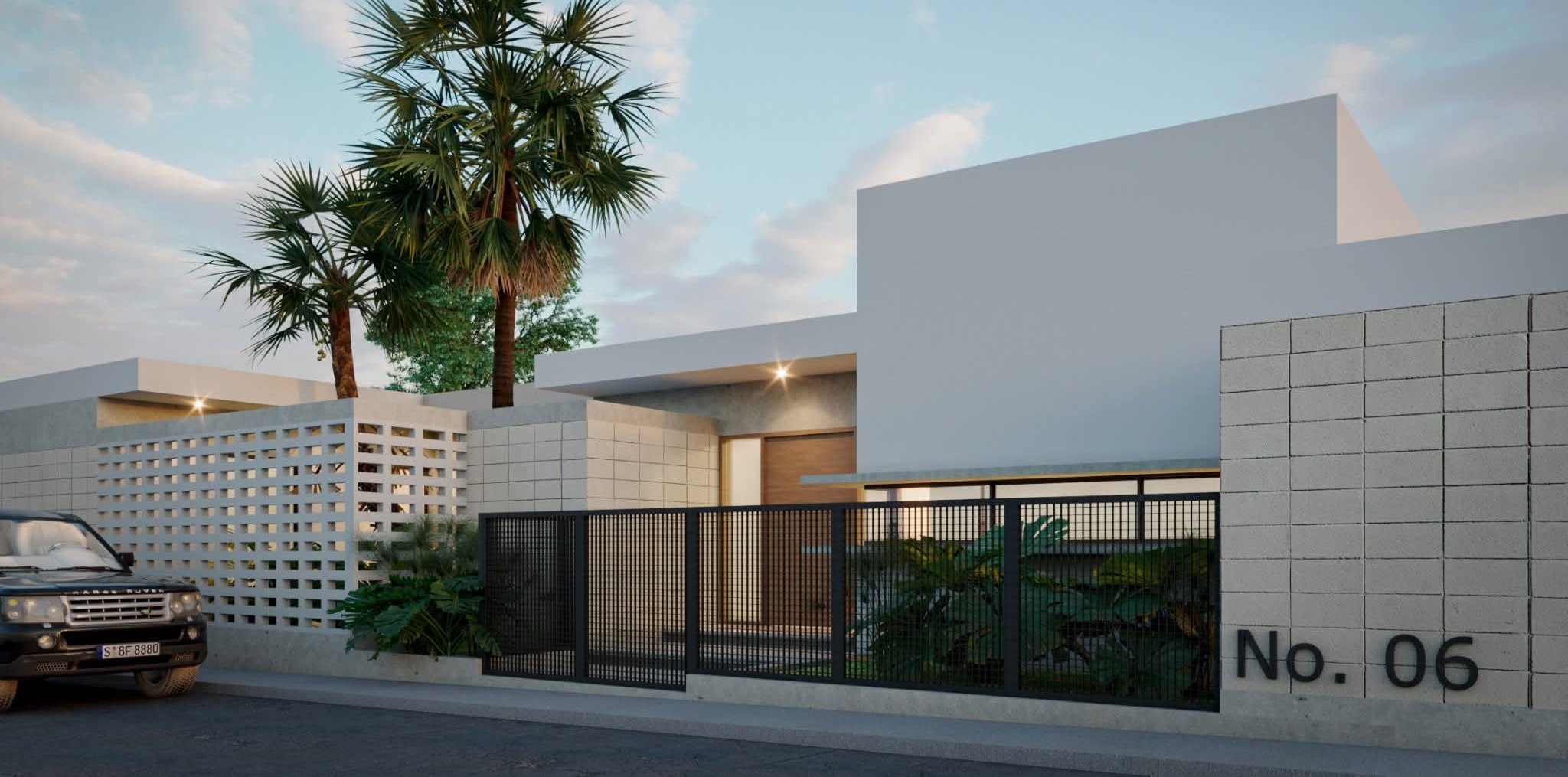 Casa No. 06, fachada principal con reja negra y palmeras